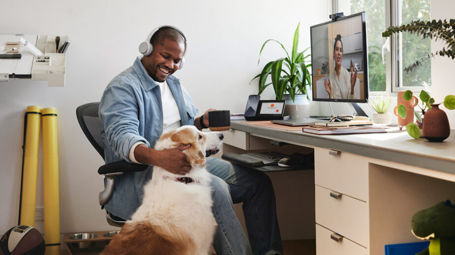 Man With Dog On Webex Call Using Various Communication Tips