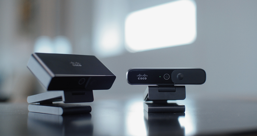 Product shot showing two webcams, one is the Cisco Desk Camera 1080p