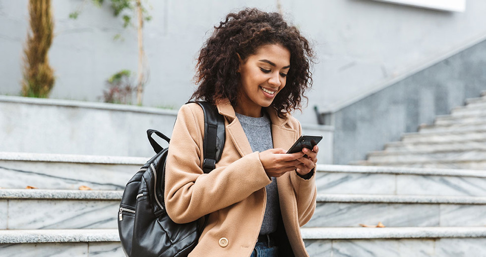 Woman Using Webex Connect On Her Collaboration Device