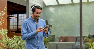 Man Using Iphone With New Webex App